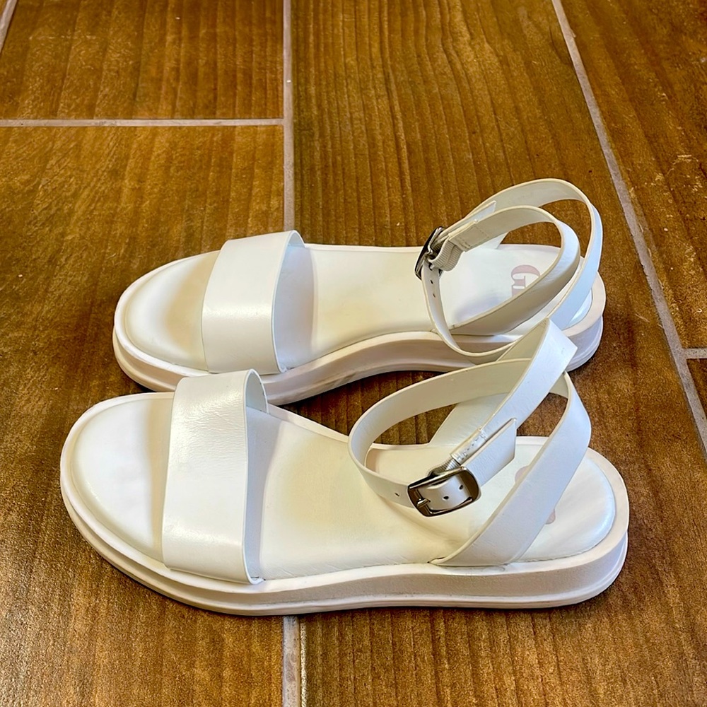 White leather sandals.
